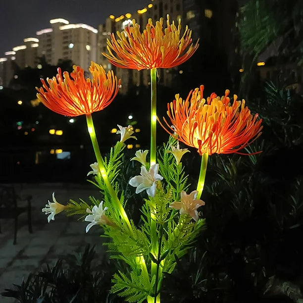 FLORIVA solar buitenlamp met feeërieke bloemen in een tuinsetting.